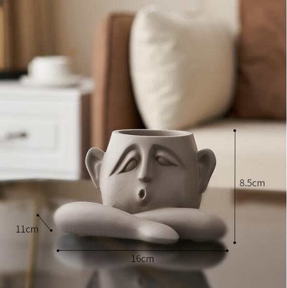 Flower Pot with Abstract Figure Decoration