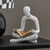 Reading Abstract Figurine