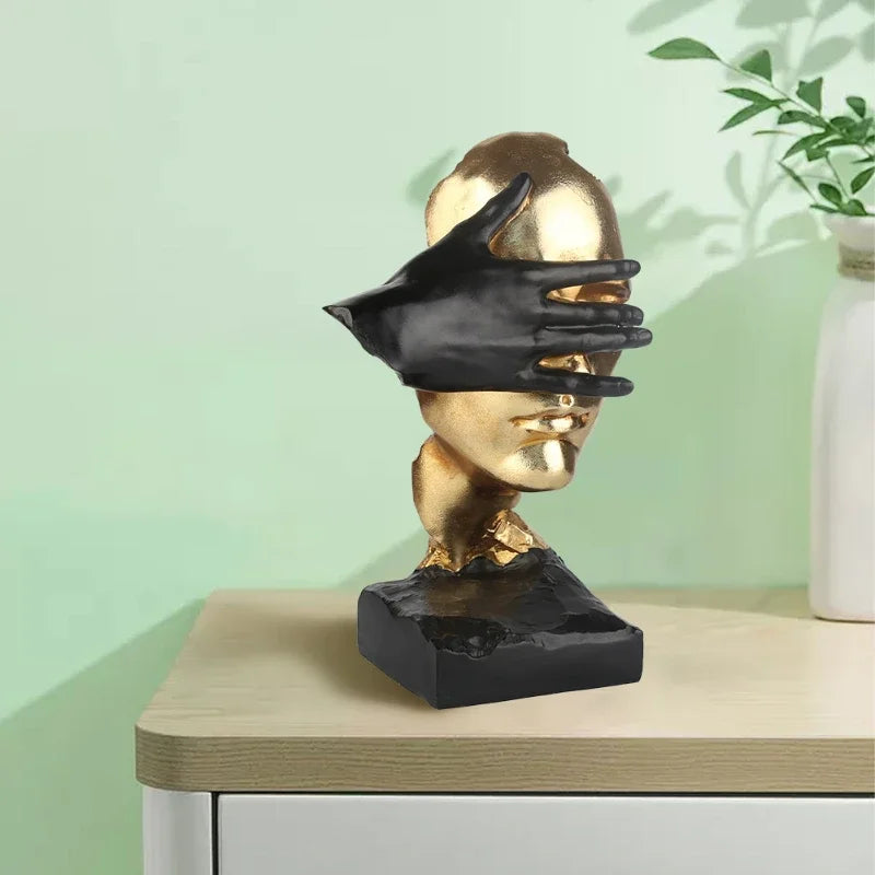 Abstract Gold and Black Face Sculpture